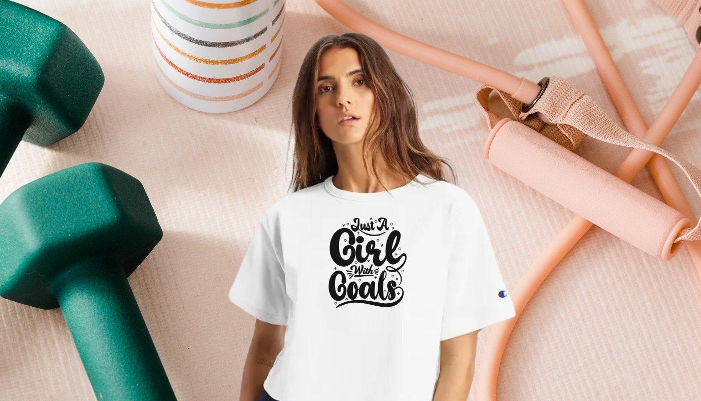 girl wearing a"just a girl with goals" white t-shirt
